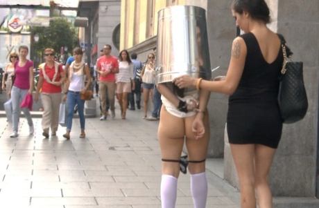 Pretty girl is totally humiliated in a public setting by other women 18459126