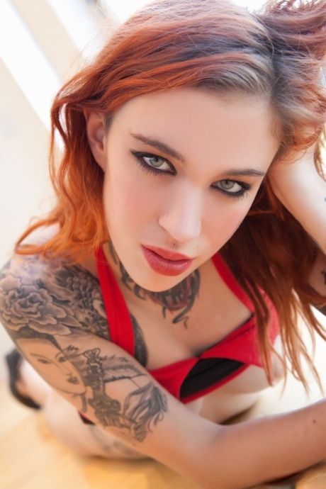 Tattooed redhead Mabel baring her perk tits and fingering her skinny twat 27135045