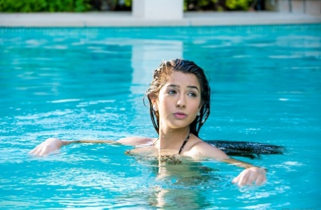 Busty Latina teen Megan Salinas masturbates in the tub after taking a swim 26652172