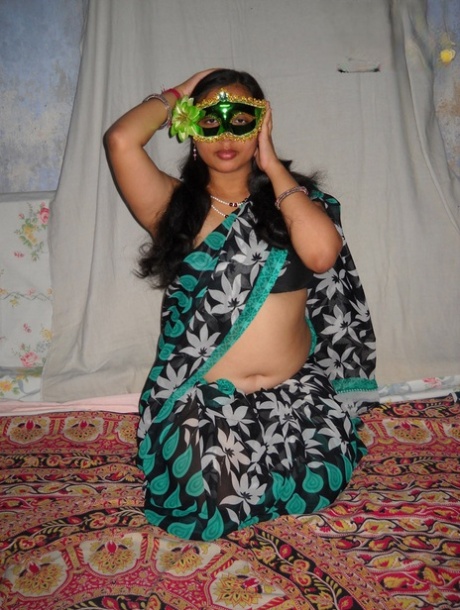 Fat Indian amateur Velamma Bhabhi gets completely naked while wearing a mask 11005835