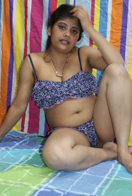 Chubby Indian female Rupali strips naked for a softcore shoot 66066078