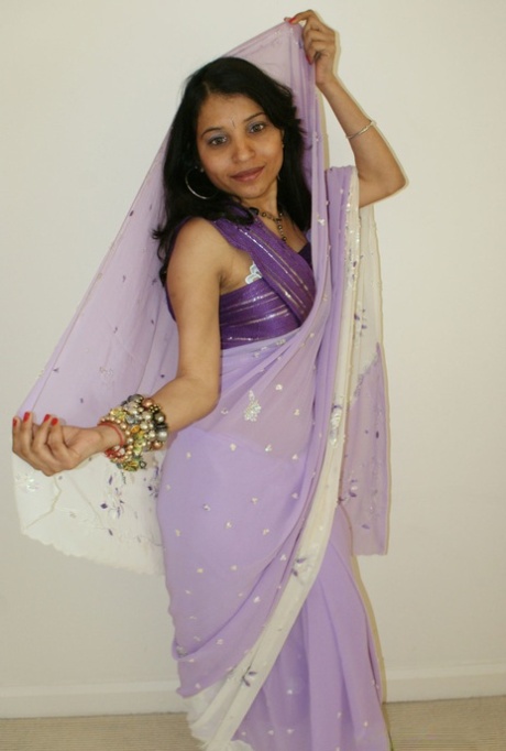 Indian solo girl Kavya unleashes her natural breasts upon her bed 82174751