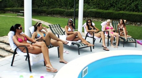 College girls engage in lesbian relations while having an all girl pool party 43920988