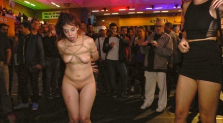 Caucasian girl is paraded in the nude while in public before giving oral sex 26222412
