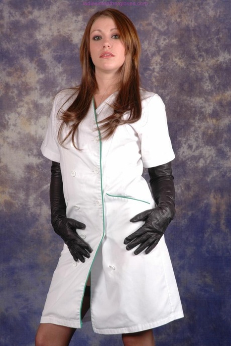 Hot nurse Sophie exposes her stocking tops in long black leather gloves 32175677