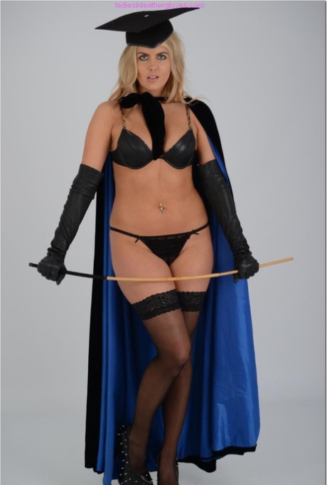 Sexy blonde Evee flexes a cane in a mortar board and leather pretties 84400405