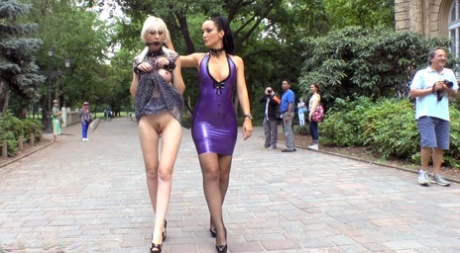 Submissive blonde is paraded nude down a public street before being gangbanged 37465189