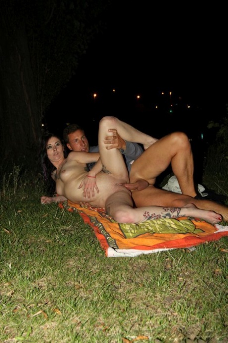 Tattooed chick and her man friend embark on a dogging session upon a towel 39451960