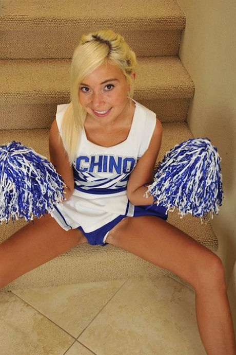 Blonde cheerleader Kaylee Hayee sets her tan lined body free on stairs 13159776