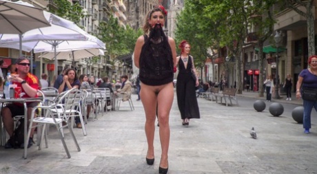 Submissive girl is paraded on a street before being fucked in a public house 78032621