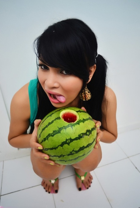 Petite Asian shemale with Big Tits fucking a watermelon 19137780