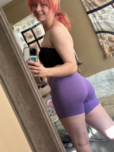OnlyFans slut with a nose ring Abby posing in her gym outfit in the mirror 10590698