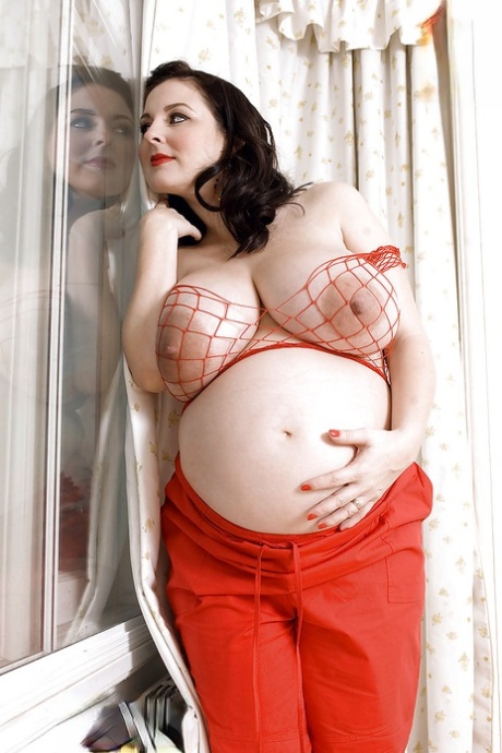 Brunette preggo with fat tits Lorna Morgan posing in fishnet bra and black panti 75357227