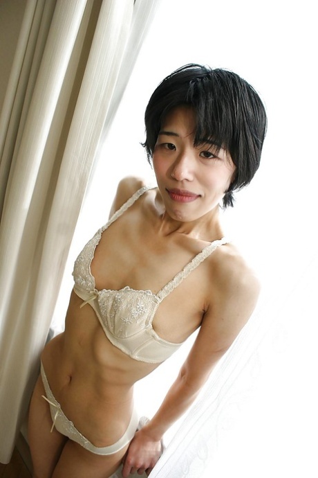Skinny Asian milf Shinobu Funayama is undressing her lingerie 71535835