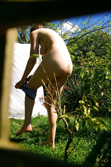 Hidden voyeur spies on naked girl getting dressed outdoors 11134871