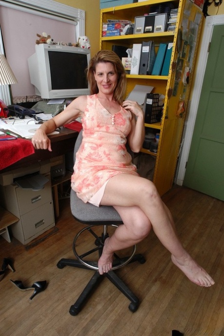 Aged office worker Linda flashing pink panties under dress 78532128