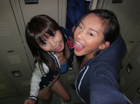 Young Asian amateur Alina Li and friend flashing flat chests in change-room 82024043