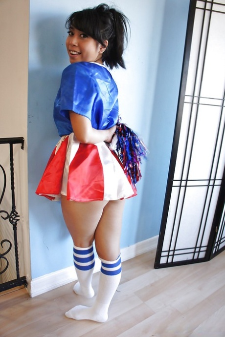 Tiny Asian cheerleader May Lee posing in cute uniform and socks 15490761