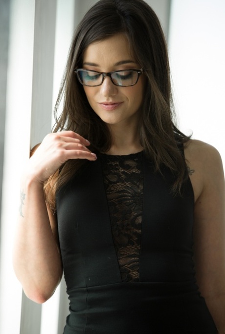 Babe in glasses Maya Bijou takes off her black lingerie exposing perky tits 28981878