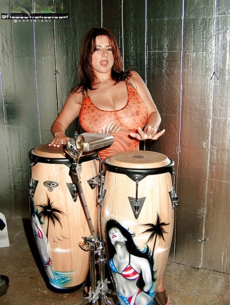 Chloe Vevrier revealing puffy boobs and booty while playing african drums 31361103