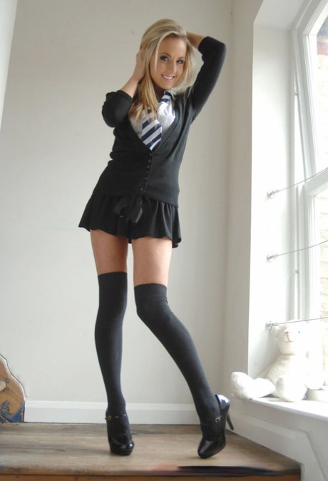 Long legged blond babe Becky Roberts posing in knee high stockings 45470507