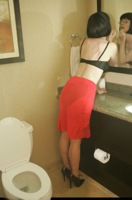 Stunning mature lady in lingerie and red skirt posing in the bath 44308850