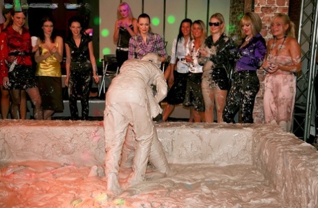 Fully clothed european fashionistas are into wild mud catfight