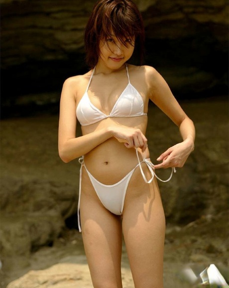 Tempting asian babe with nice jugs posing in bikini outdoor 95589281