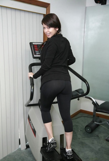 Sporty latina with pigtails Evie Dellatossa stripping in the gym 93325424