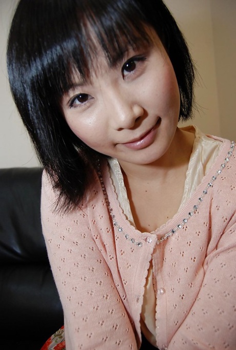 Asian babe Minori Nagakawa stripping down and exposing her hairy cunt 23645854