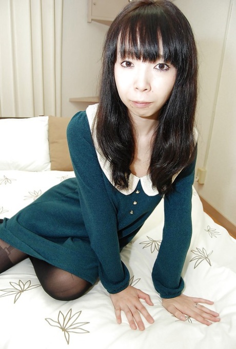 Asian babe Yuka Kakihara undressing and exposing her cunt in close up 16691420