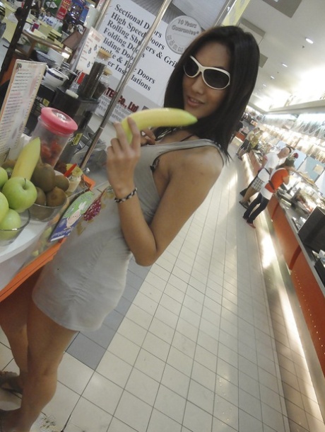 Gorgeous Thai tranny Magan playing with her hairy dick and posing in public 56084780